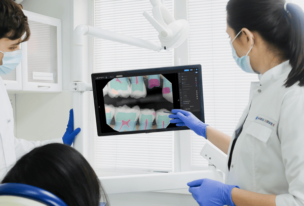 Dr reviewing radiograph